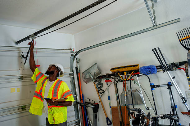 Professional Garage Door technician working in Valley Stream, NY